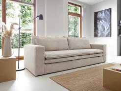 Vente-unique Fluweel / Suede-Driezitsslaapbank Van Cremewit Ribfluweel Tilia.