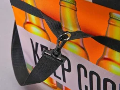 Vente-unique Opbergaccessoire-Fabo Opbergdozen Koeltas, Kruk, Draagriem, Zwart, Wit, Oranje.